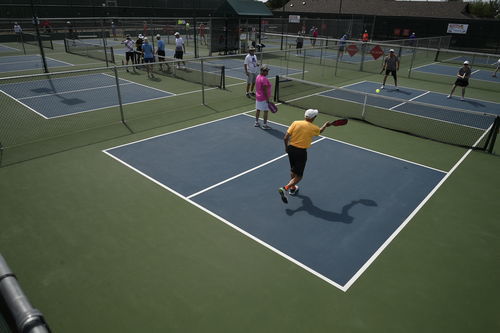 Robson Ranch hosted the Quad States Senior Pickleball Tournament this week. The tournament was for players age 50 and older. Pickleball is a sport combing elements of tennis, badminton and table tennis where players volley a wiffle ball over a net with sol